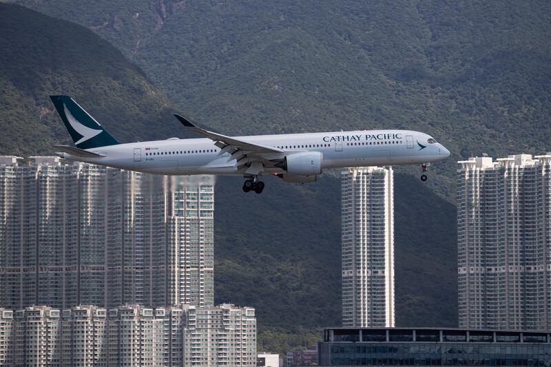 A Cathay Pacific Airways jetliner prepares to land at Hong Kong International Airport in China. EPA