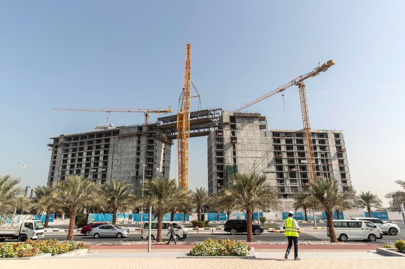 DUBAI, UNITED ARAB EMIRATES. 18 JANUARY 2021. A first for Ras Al Khaimah, an engineering marvel and a milestone in the construction of the Mövenpick Resort Al Marjan Island as a structual bridge is put in place between the hotel structures. (Photo: Antonie Robertson/The National) Journalist: Kelly Clarke. Section: National.