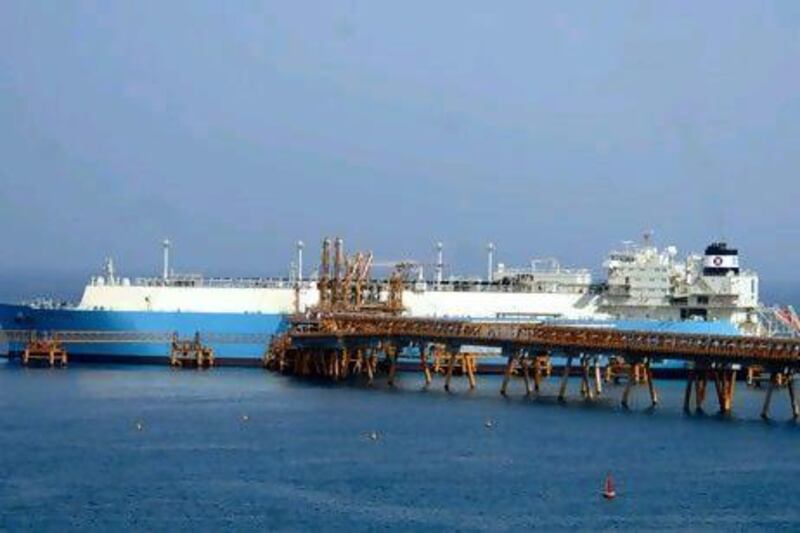An LNG tanker is docked near the Yemeni port of Balhaf. Unrest in the country could disrupt gas and oil exports.