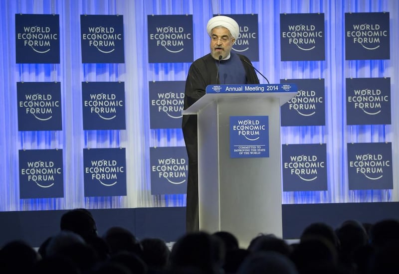 A reader says President Hassan Rouhani should not forget his commitment to Iranians while trying to improve Iran’s image. Above, Mr Rouhani speaks at the World Economic Forum in Davos last week. Michel Euler / AP Photo

