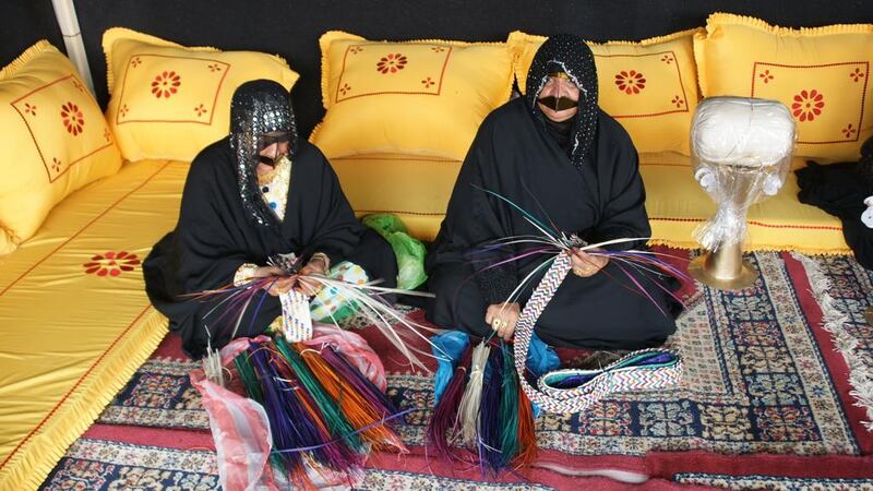 Emirati women weave baskets at the Tan-Tan Moussem Festival in Morocco. Courtesy TCA