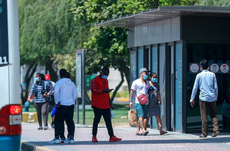 Abu Dhabi, United Arab Emirates, September 18, 2020.  Commuters get off the bus at Abu Dhabi on a Friday afternoon.
Victor Besa /The National
Section:  NA/Standalone.