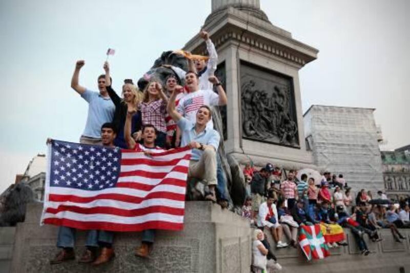 LONDON, ENGLAND - JULY 27:  United States' fans celebrate the openning of the London 2012 Olympic Games at Trafalgar Square on July 27, 2012 in London, England.  (Photo by Feng Li/Getty Images) *** Local Caption ***  149363229.jpg