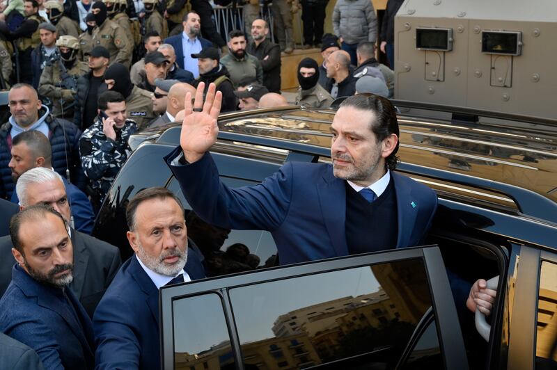 Saad Hariri waves to his supporters. EPA 