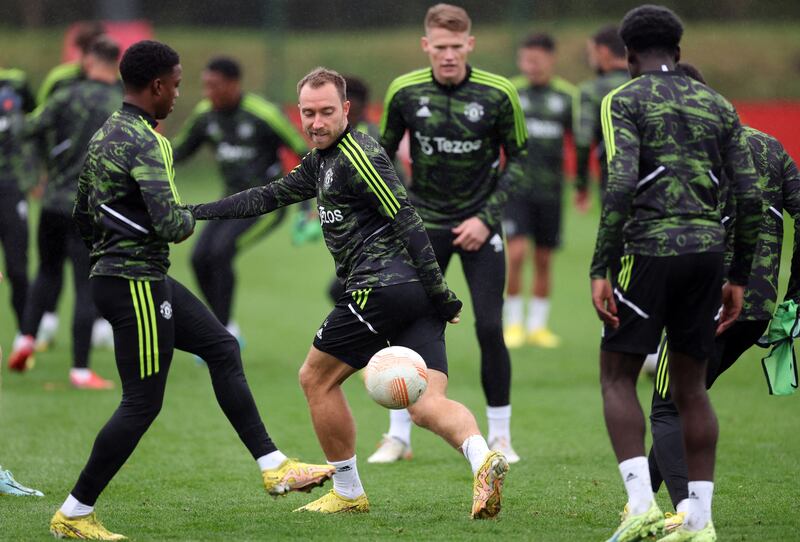 Manchester United's Christian Eriksen with teammates during training. Reuters