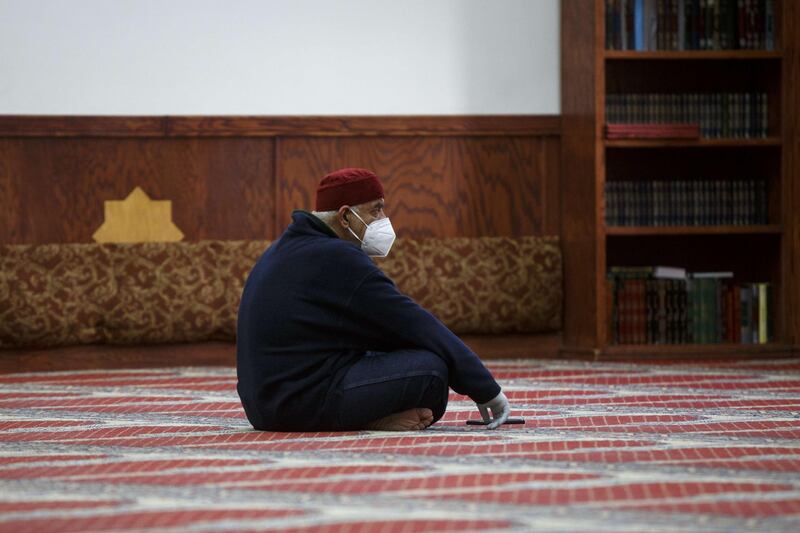 Adnan Ell Kadri listens to prayers in a nearly empty room at Masjid Al Salaam on the first full day of Ramadan on April 24, 2020 in Dearborn, Michigan. Getty Images via AFP