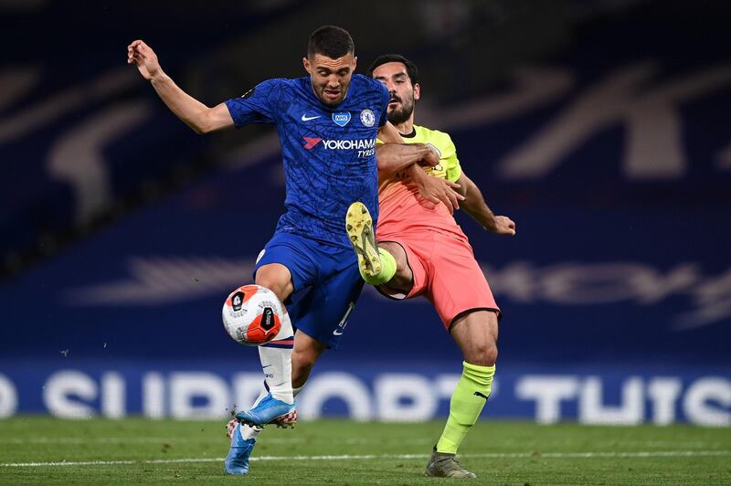 LONDON, ENGLAND - JUNE 25: Mateo Kovacic of Chelsea is challenged by Ilkay Gundogan of Manchester City during the Premier League match between Chelsea FC and Manchester City at Stamford Bridge on June 25, 2020 in London, United Kingdom. (Photo by Darren Walsh/Chelsea FC via Getty Images)