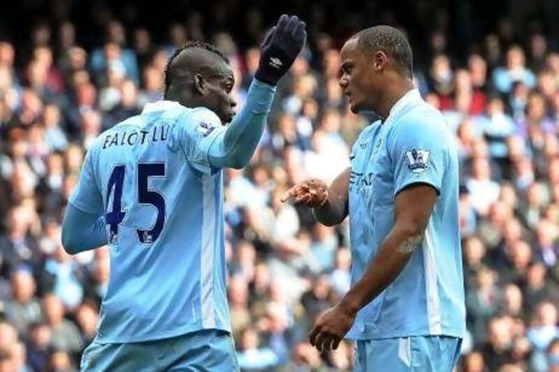Manchester City’s Mario Balotelli, left, argues with his club captain Vincent Kompany during last week’s game against Sunderland.