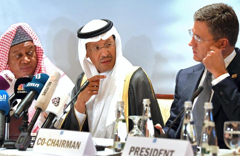 OPEC Secretary General Mohammed Sanusi Barkindo (L), Saudi Arabia's Energy Minister Prince Abdulaziz bin Salman (C) and Russian Energy Minister Alexander Novak (R) attend an Opec-JMMC meeting in the UAE capital Abu Dhabi on September 12, 2019. (Photo by KARIM SAHIB / AFP)