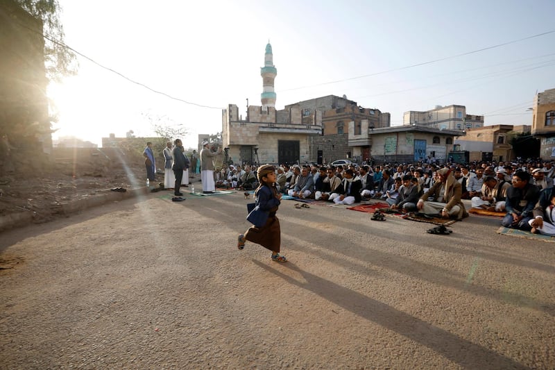 Worshippers at Eid Al Fitr prayers in a square in Houthi-controlled Sanaa. EPA