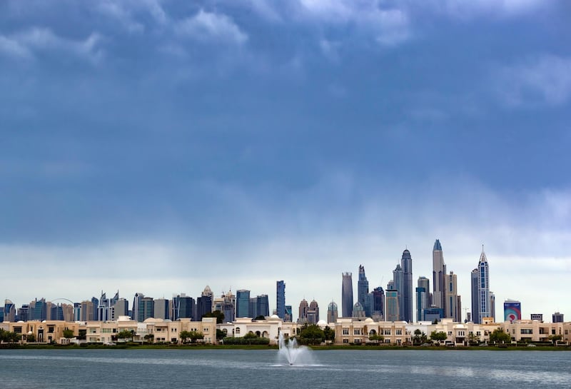 Dubai, United Arab Emirates - April 10, 2019: Dark clouds over the Dubai skyline. Wednesday the 10th of April 2019. The Springs, Dubai. Chris Whiteoak / The National