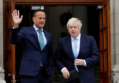 FILE PHOTO: Ireland's Prime Minister (Taoiseach) Leo Varadkar waves as he meets Britain's Prime Minister Boris Johnson in Dublin, Ireland, September 9, 2019. REUTERS/Phil Noble/File Photo