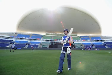 England captain Eoin Morgan walks out to bat during a nets session at Zayed Cricket Stadium. Gareth Copley / Getty Images