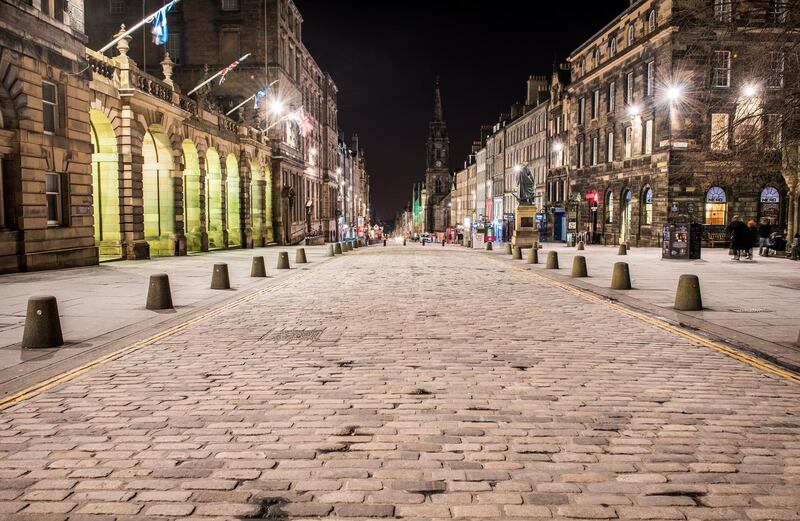 The High Street, part of the Royal Mile, in Edinburgh's Old Town at night.The City Chambers, the seat of Edinburgh's local government is on the left of the image. Getty Images