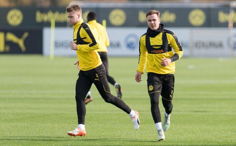 Borussia Dortmund’s Marco Reus and Mario Gotze, right, in training. Guido Kirchner / DPA / AFP