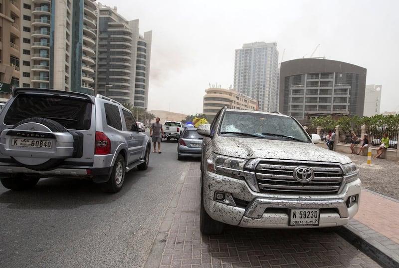 DUBAI, UNITED ARAB EMIRATES 13 MAY 2018 -A car damage  from the  burning Zen Towerin Marina, Dubai. Leslie Pableo for The National