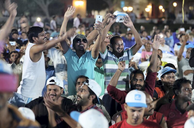 DUBAI , UNITED ARAB EMIRATES, September 27 , 2018 :- Workers enjoying the DU  & Western Union Camp Ka Champ held at Nuzul Accommodation in Jabel Ali Industrial area in Dubai. ( Pawan Singh / The National )  For News/Big Picture/Instagram/Online. Story by Patrick