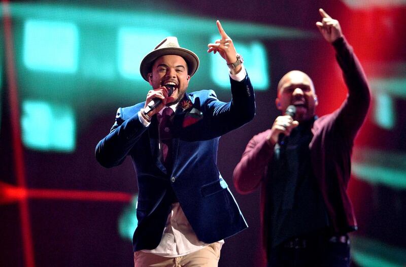 5th place: Singer Guy Sebastian, left, representing Australia performs during the Grand Final of the 60th annual Eurovision Song Contest. Julian Stratenschulte / EPA