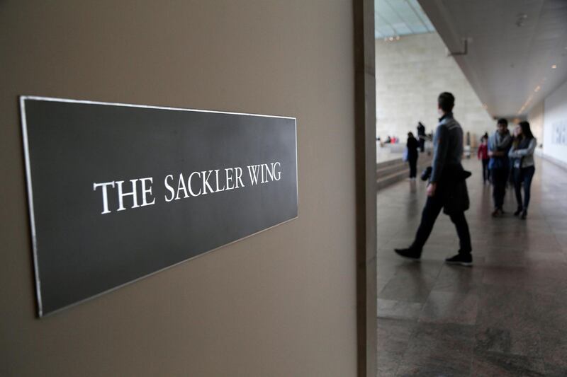 File-This  Jan. 17, 2019, file photo shows a sign with the Sackler name is displayed at the Metropolitan Museum of Art in New York. The Metropolitan Museum of Art on Wednesday, May 15, 2019, said it would stop taking monetary gifts from members of the Sackler family who are connected to the pharmaceutical company that makes OxyContin, cutting a longstanding philanthropic relationship at a time when cultural institutions are coming under increasing scrutiny over their donors. (AP Photo/Seth Wenig, File)