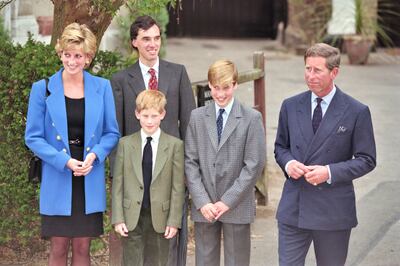 British Royal Diana, Princess of Wales (1961-1997), wearing a blue jacket over a black dress, with Eton housemaster Dr Andrew Gailey, Prince Harry, Prince William, and Prince Charles outside Manor House on Prince William's first day at Eton College in Eton, Berkshire, England, 16th September 1995. (Photo by Princess Diana Archive/Hulton Archive/Getty Images)