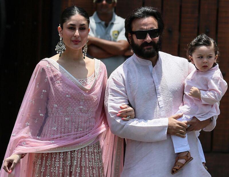 Couple Kareena Kapoor Khan (L) and Saif Ali Khan with their son Taimur arrive at the wedding ceremony of his sister and Bollywood actress Sonam Kapoor in Mumbai, India, 08 May 2018. The 32-year-old actress got married to Indian  businessman Anand Ahuja in a sikh wedding at her aunt's mansion Rockdale.  EPA/DIVYAKANT SOLANKI