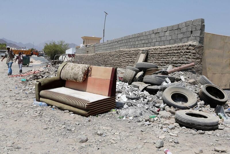 Residents of Merbeh say dumped furniture is attracting insects and strays. Pawan Singh / The National