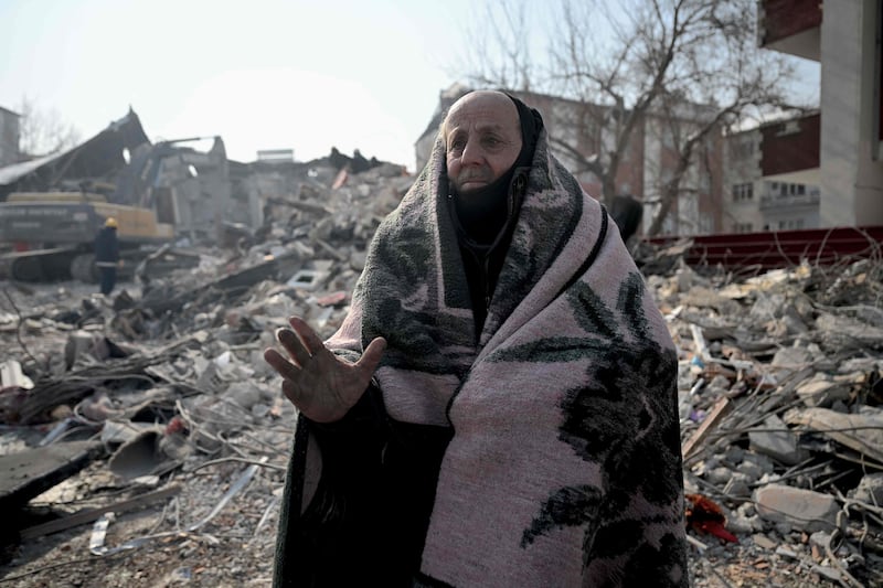 A resident in front of his collapsed building in the Elbistan district of Kahramanmaras. AFP