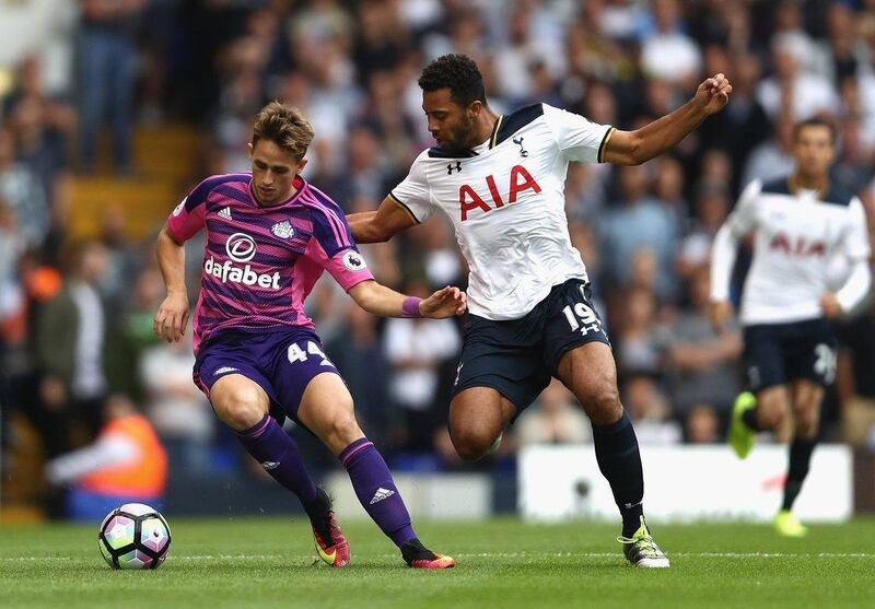 Adnan Januzaj of Sunderland, left, is put under pressure from Mousa Dembele of Tottenham Hotspur. Julian Finney / Getty Images