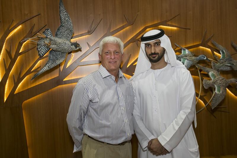 Jim Robison, left, and Mohammed Al Kamda, are business partners and friends united in their love of falconry. Mona Al Marzooqi / The National