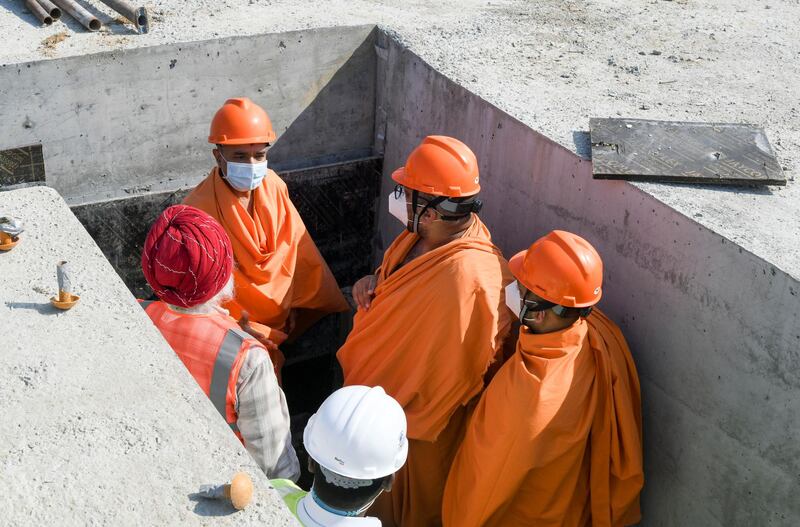 Abu Dhabi, United Arab Emirates - Head priests also discuss with contractors and partake in the construction of Bochasanwasi Shri Akshar Purushottam Swaminarayan Sanstha also known as, BAPS Hindu temple in Abu Dhabi. Khushnum Bhandari for The National