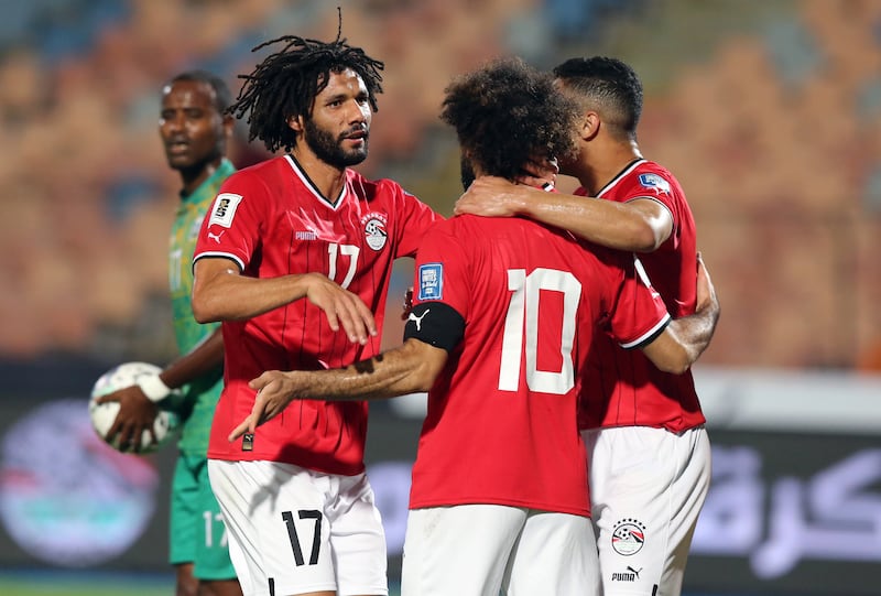 Mohamed Salah celebrates with teammate Mohamed Elneny after scoring for Egypt against Djibouti. EPA