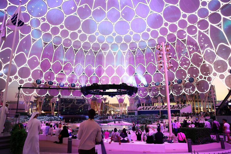 Visitors watch a spectacular audio-visual show at Al Wasl Plaza at Expo 2020 Dubai. All photos: Pawan Singh / The National