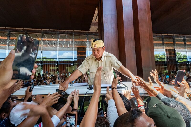 Indonesian presidential candidate Prabowo Subianto greets supporters during a campaign rally in Denpasar, Bali, Indonesia.  Indonesia is scheduled to hold the presidential and general elections on 14 February.   EPA