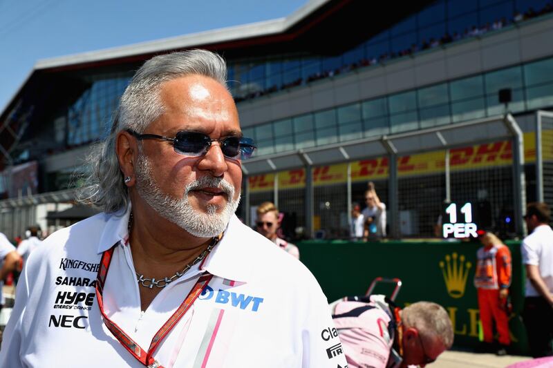 NORTHAMPTON, ENGLAND - JULY 08: Force India Chairman Vijay Mallya on the grid before the Formula One Grand Prix of Great Britain at Silverstone on July 8, 2018 in Northampton, England.  (Photo by Mark Thompson/Getty Images)