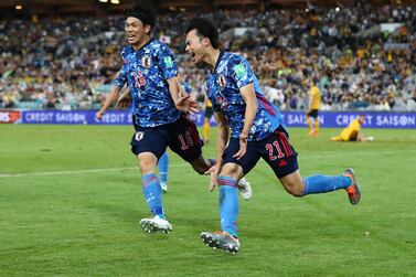 SYDNEY, AUSTRALIA - MARCH 24: Kaoru Mitoma of Japan celebrates scoring a goal during the FIFA World Cup Qatar 2022 AFC Asian Qualifying match between the Australia Socceroos and Japan at Accor Stadium on March 24, 2022 in Sydney, Australia. (Photo by Mark Metcalfe / Getty Images)