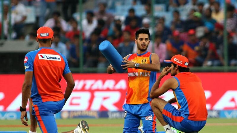 Chirag Suri, centre, during the warm-up ahead of the Gujarat Lions' Indian Premier League game against the Delhi Daredevils.
