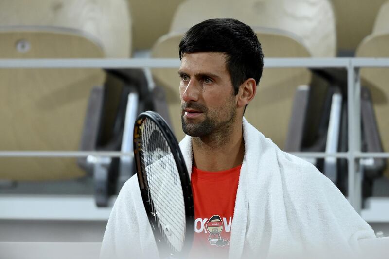 PARIS, FRANCE - SEPTEMBER 25: Novak Djokovic of Serbia looks on during a training session at Roland Garros  on September 25, 2020 in Paris, France. (Photo by Martin Sidorjak/Getty Images)