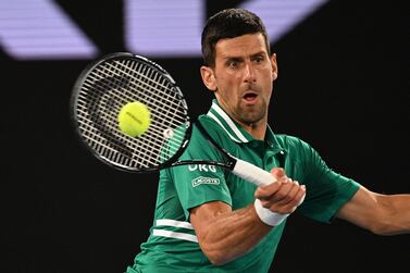 Novak Djokovic on his way to a five-sets victory over Taylor Fritz at Melbourne Park. EPA