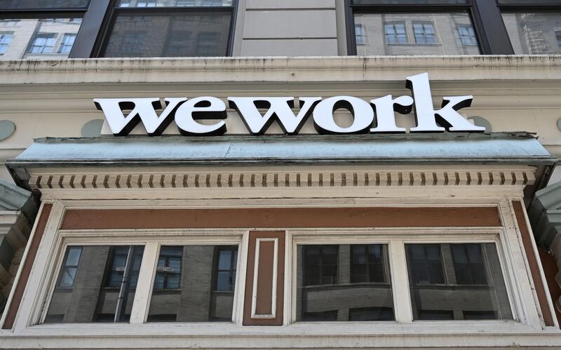 (FILES) In this file photo taken on July 19, 2019, a WeWork office is seen in New York City on July 19, 2019.  WeWork has slashed by more than half its valuation target after setting an ambitious goal for the fast-growing office-sharing startup, sources familiar with the company said on September 5, 2019. WeWork parent We company is eyeing a target market value of around $20 billion after hearing doubts about its prospects from potential investors over a $47 billion valuation, the sources said. The startup launched in 2010 touts itself as revolutionizing commercial real estate by offering shared, flexible workspace arrangements, and has operations in 111 cities in 29 countries. / AFP / TIMOTHY A. CLARY
