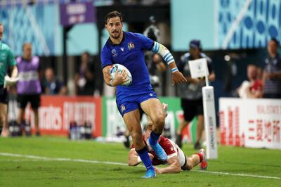 FUKUOKA, JAPAN - SEPTEMBER 26: Mattia Bellini of Italy breaks before scoring his team's fifth try during the Rugby World Cup 2019 Group B game between Italy and Canada at Fukuoka Hakatanomori Stadium on September 26, 2019 in Fukuoka, Japan. (Photo by Shaun Botterill/Getty Images)