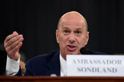 In this Nov. 20, 2019, photo, U.S. Ambassador to the European Union Gordon Sondland testifies before the House Intelligence Committee on Capitol Hill in Washington, during a public impeachment hearing of President Donald Trump's efforts to tie U.S. aid for Ukraine to investigations of his political opponents. (AP Photo/Susan Walsh)