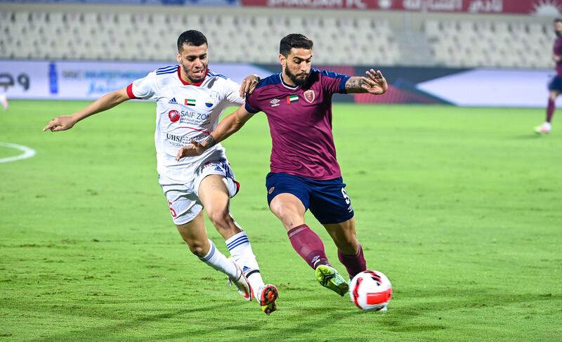 Al Wahda’s Joao Pedro challenged by Sharjah defender Hamad Jasim in the Adnoc Pro League matchweek-9 at Sharjah stadium on Wednesday, November 3, 2021. Photo: PLC