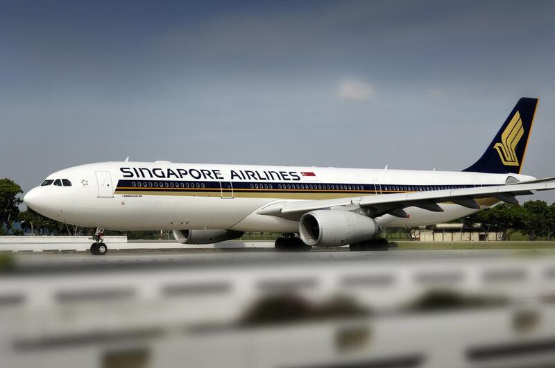 Singapore Airlines. The world's airlines carried a record 3.3 billion passengers on 27 million flights in 2014. Munshi Ahmed / Bloomberg





