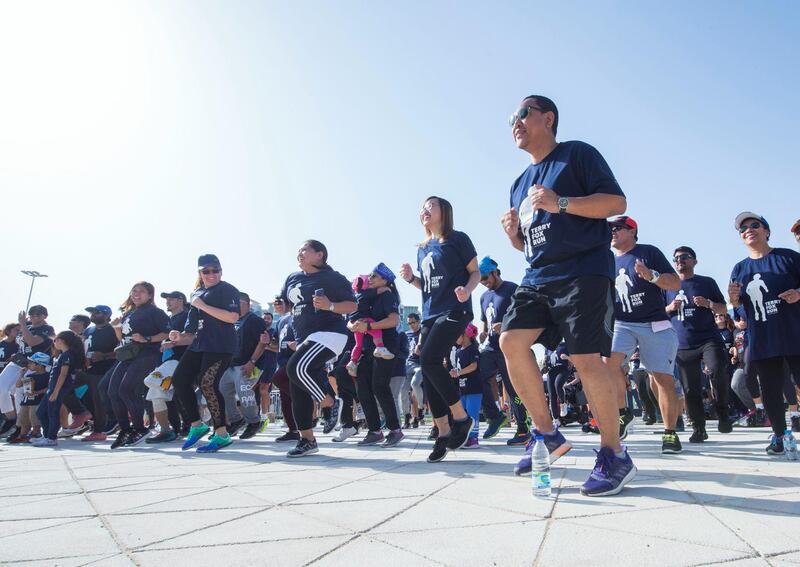 ABU DHABI, UNITED ARAB EMIRATES - Warming up before the event at the Terry Fox Run, Corniche Beach.  Leslie Pableo for The National