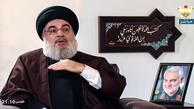 epa08906905 A video grab taken from Hezbollah's al-Manar TV shows Hezbollah leader Sayyed Hassan Nasrallah during an interview with Al Mayadeen TV  in Beirut, Lebanon, 27 December 2020. Nasrallah spoke about the political situation in the Arab region after several countries started normalizing relations with Israel, about his relationship with the Iranian commander Suleimani, among other things.  EPA/AL-MANAR TV / HANDOUT  HANDOUT EDITORIAL USE ONLY/NO SALES