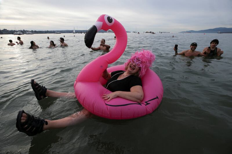 A woman bathes in chilly waters while celebrating New Year's Day with the Polar Bear Swim in Vancouver, Canada. Reuters