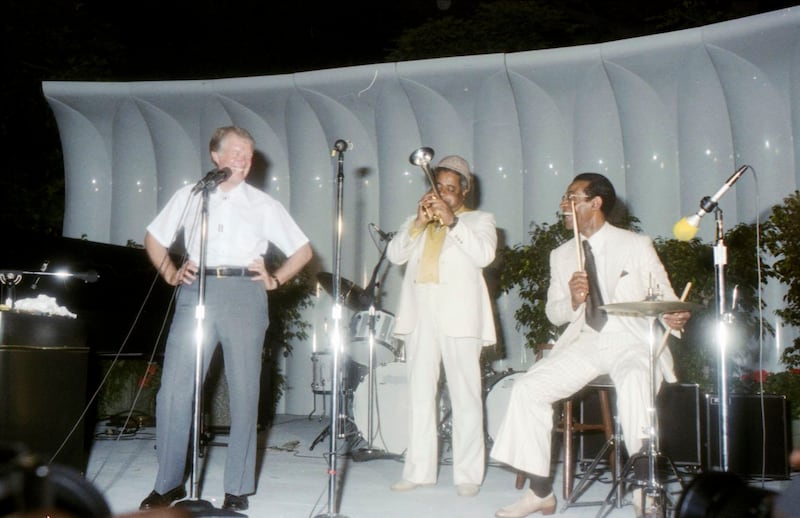 The former president singing Salted Peanuts with Dizzy Gillespie at a party on the South Lawn of the White House.