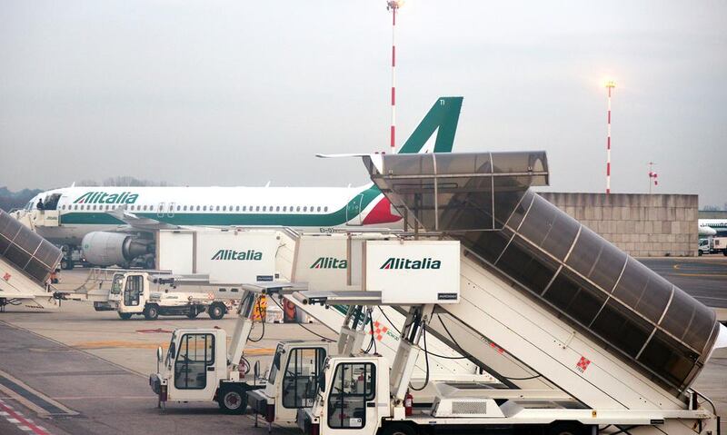Up to 2,250 of Alitalia staff are expected to go under Etihad Airways’ downsizing demand. Vincenzo Pinto / AFP