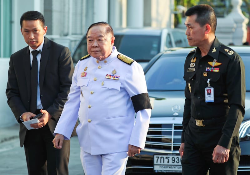 Thailand's Deputy PM Prawit Wongsuwan arrives at the temple. Reuters