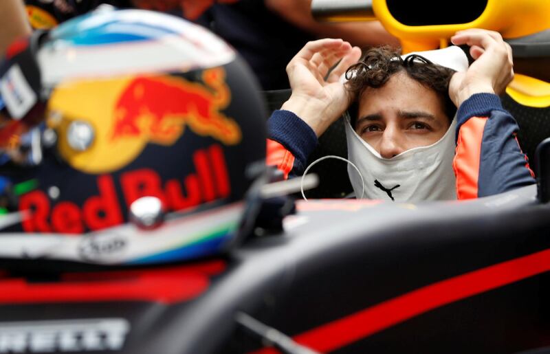 Formula One - F1 - Abu Dhabi Grand Prix - Yas Marina Circuit, Abu Dhabi, United Arab Emirates - November 25, 2017. Mercedes' Formula One driver, Red Bull's Formula One driver Daniel Ricciardo of Australia stops at the pitlane. REUTERS//Ahmed Jadallah